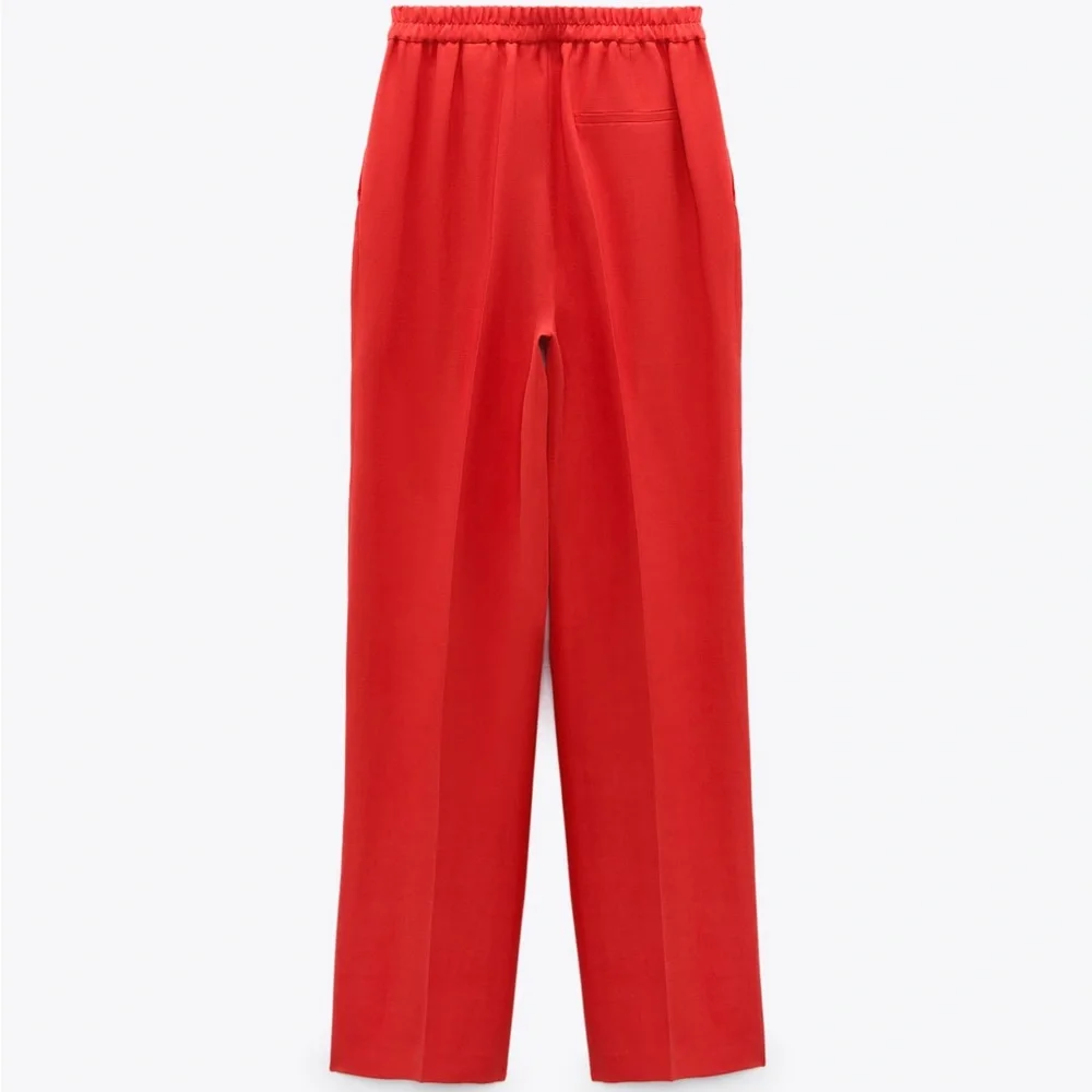 New Zara red linen trousers
